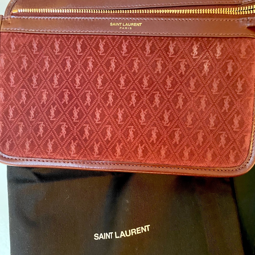 Brand new with tags saint laurent burgundy pouch. YSL